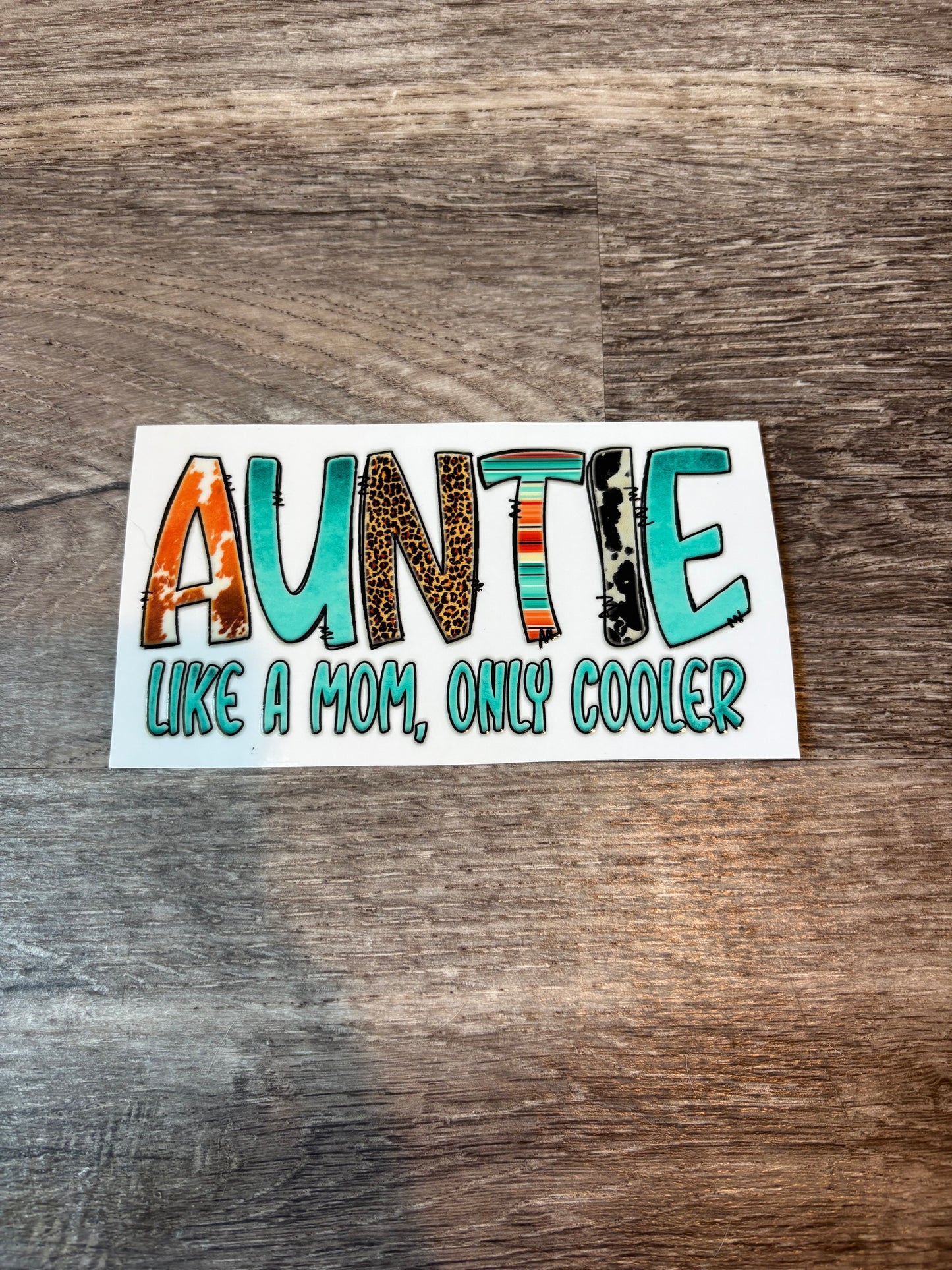 60a: Auntie like a Mom, Only Cooler