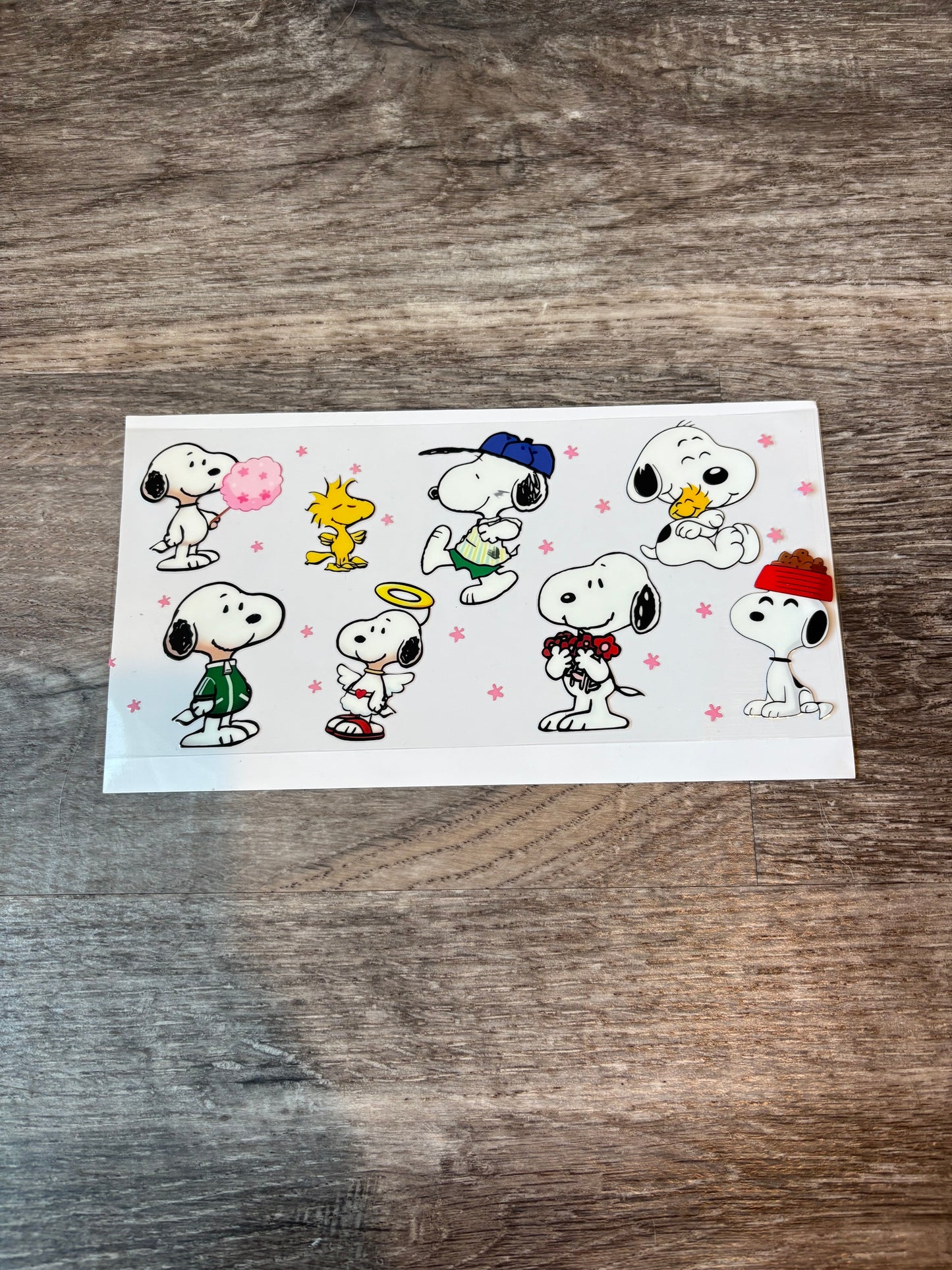 55a: Snoopy